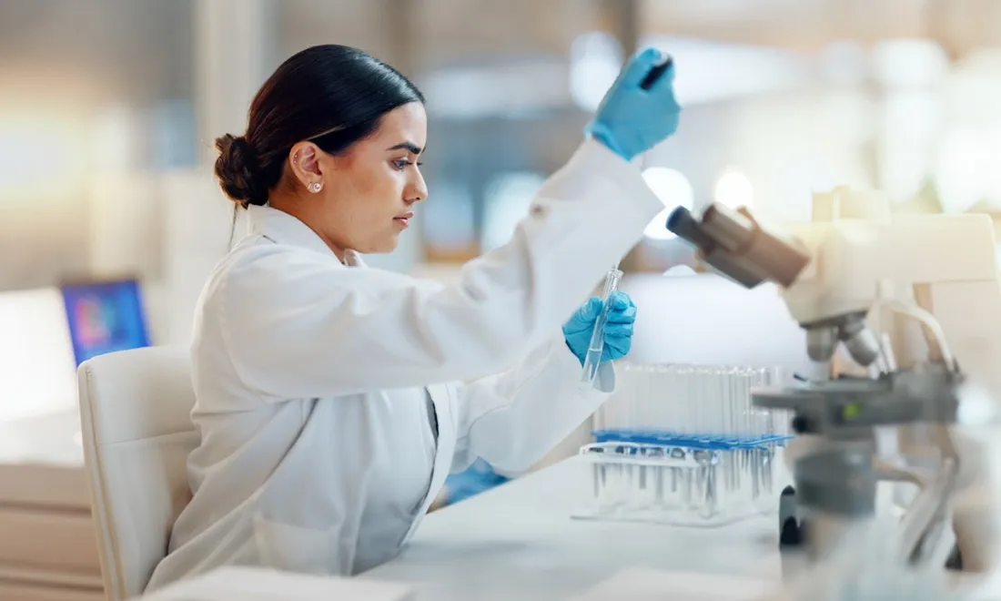 Scientist working at a laboratory bench